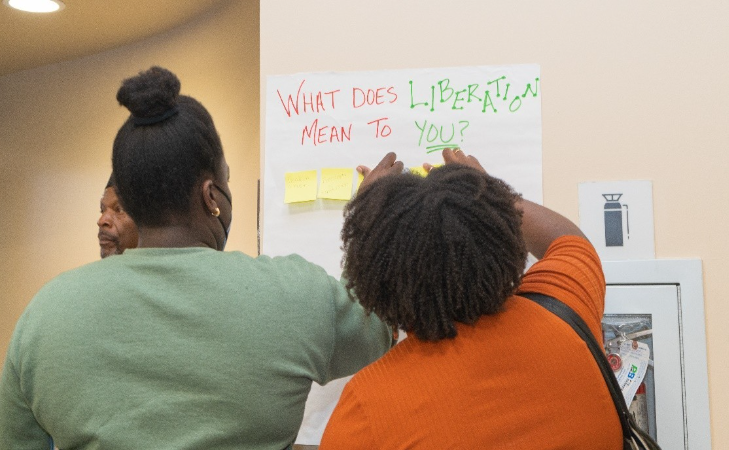 A person writing on a white board

AI-generated content may be incorrect.