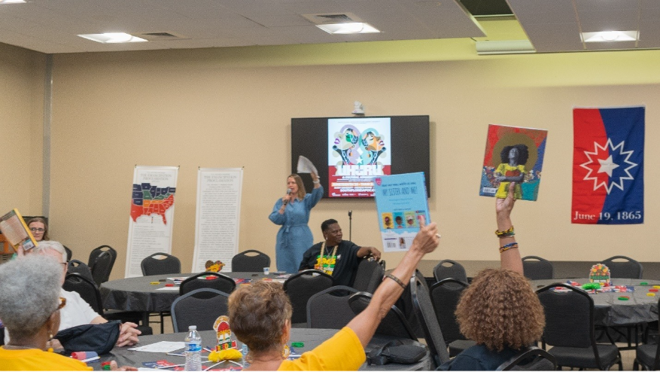 A group of people in a room

AI-generated content may be incorrect.