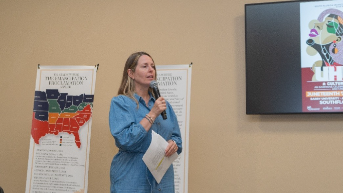 A person speaking into a microphone

AI-generated content may be incorrect.