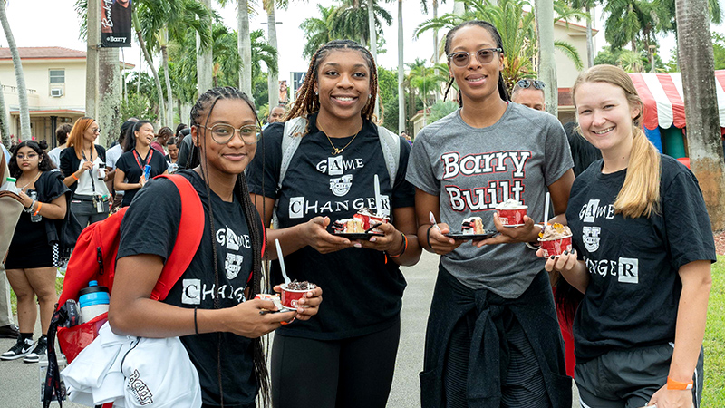 Portrait of students at event on campus